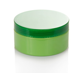 Cosmetics cream in the green jar