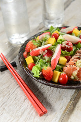 salad with salmon sashimi