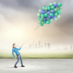 Woman with balloons