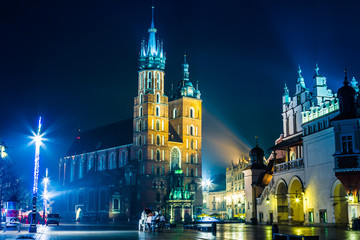 Fototapeta na wymiar Poland, Krakow. Market Square at night.