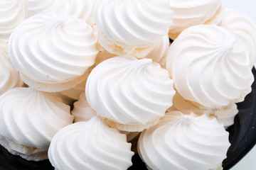 French vanilla meringue cookies on white background