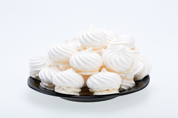 French vanilla meringue cookies on white background