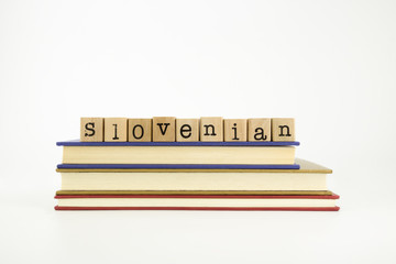 slovenian language word on wood stamps and books