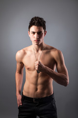 Fototapeta premium Portrait of young bodybuilder man