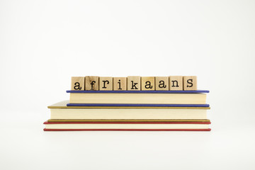 afrikaans language word on wood stamps and books