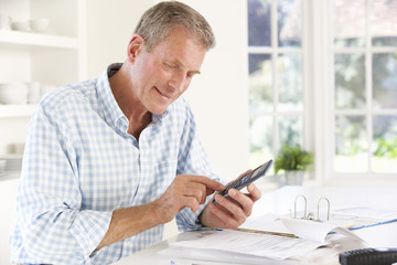 Retired man with household bills