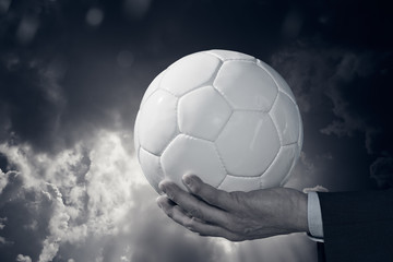 Soccer ball and businessman