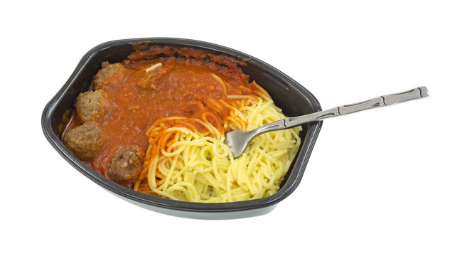 Microwaved spaghetti and meatball TV dinner