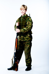 Fototapeta premium young man in camouflage with a sniper rifle