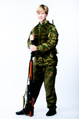 young man in camouflage with a sniper rifle