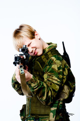 young man in camouflage with a sniper rifle
