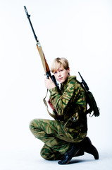 young man in camouflage with a sniper rifle