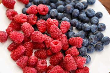 berries on white plate