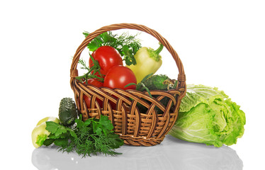 Basket with vegetables, pepper and cucumber