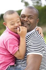 Fototapeta premium Father with Downs Syndrome son