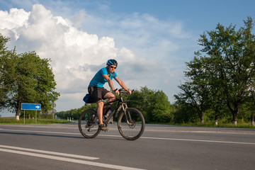 Man cycling at the road