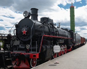 Fototapeta premium Zabytkowy pociąg kolejowy napędzany parą