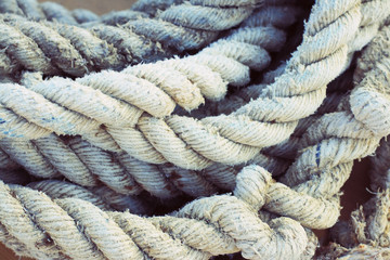 Fototapeta na wymiar White rope on pier