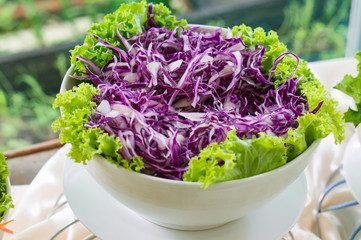 pile of cut red cabbage in a glass cup