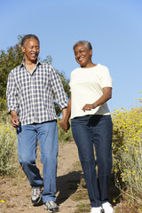 Senior  couple on country walk