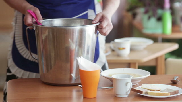 Pouring soup