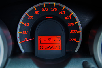 Modern Car Speedometer and Illuminated Dashboard