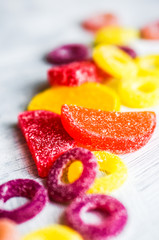 Assorted candies on white background