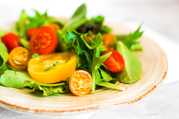 Green salad with colorful tomatoes