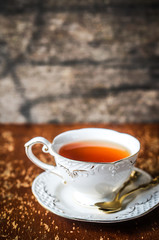 Cup of tea on wooden background
