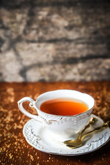 Cup of tea on wooden background