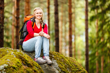 Young woman hiker on a break