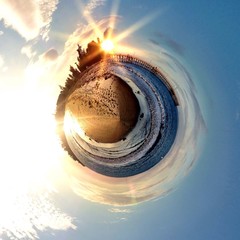 abstract small globe with a beach in a circular shape