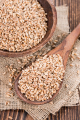 Wheat Grains on wooden table
