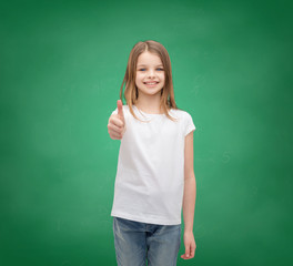 girl in blank white t-shirt showing thumbs up