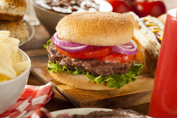 Hearty Grilled Hamburger with Lettuce and Tomato