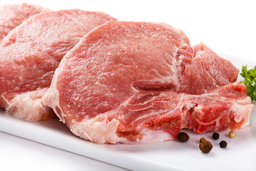 Fresh raw pork on white background