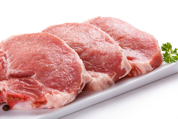 Fresh raw pork on white background