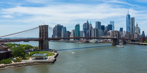 Panoramic view of lower Manhattan and Brooklyn bridge in New Yor