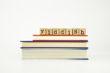 yiddish language word on wood stamps and books