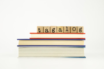 tagalog language word on wood stamps and books