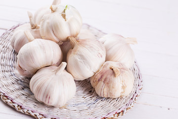 Garlic on wooden background