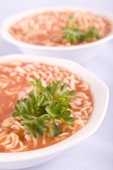 tomato soup with pasta and parsley