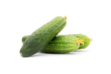 Cucumber and slices isolated over white background