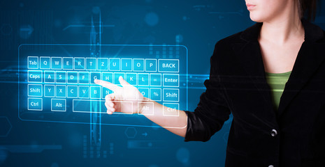 Girl pressing virtual type of keyboard