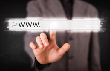 Young businessman touching web browser address bar with www sign