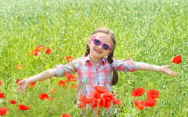 girl on red flower meadow
