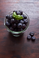 bowl of blueberries on rustic wooden table