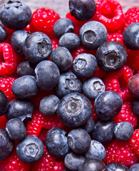 Raspberry and blueberry background 