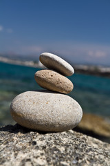 stack of stone on sea shore closeup. 