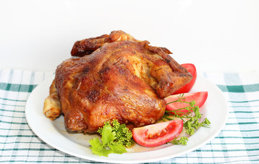 Roasted chicken seasoned with tomatoes